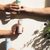 product-featured no-display hands holding low sugar drinks lifestyle new